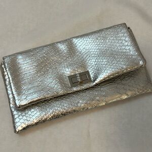 Limited Edition silver croc print clutch with long silver chain strap.